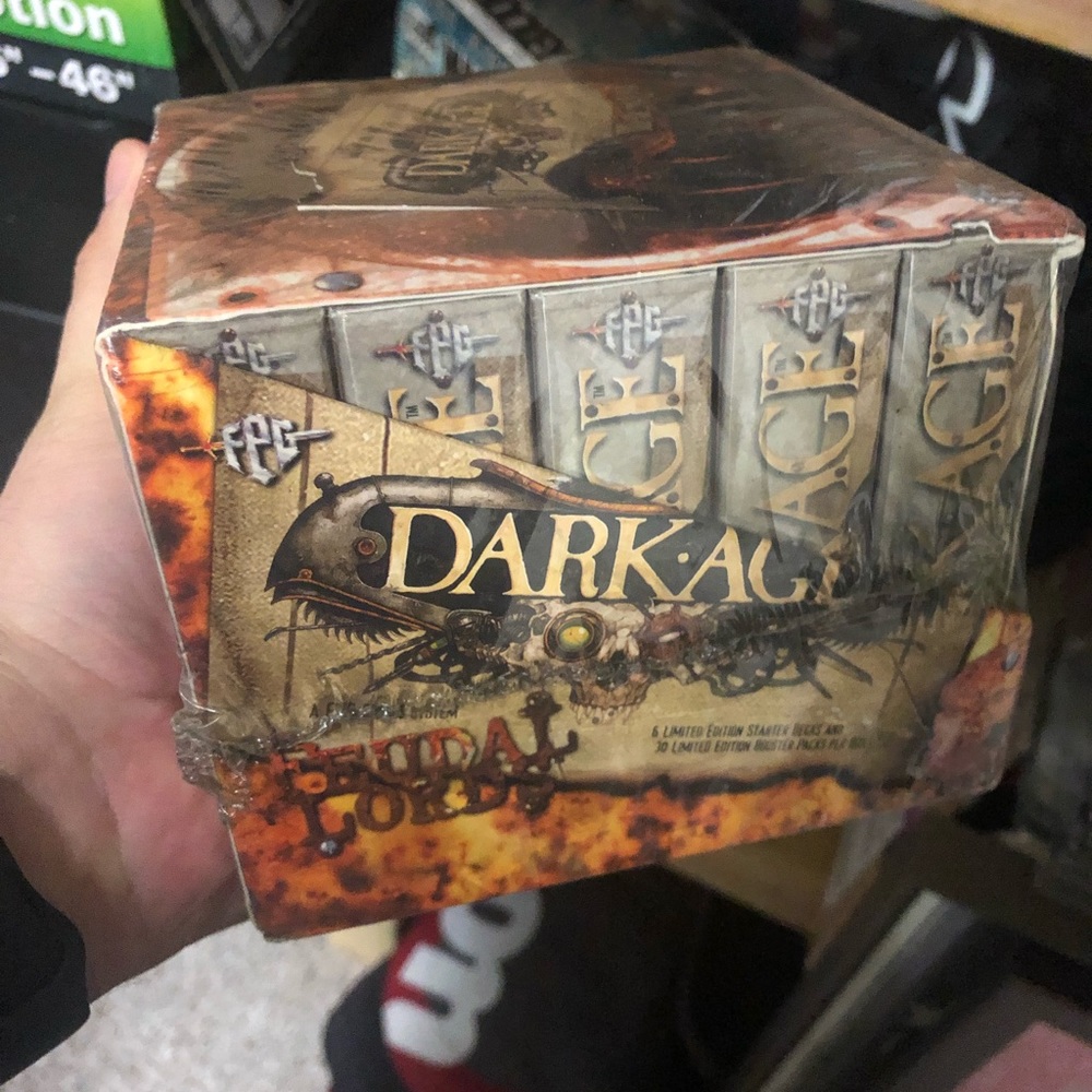 Dark age ccg booster and starter box from 1996. Sealed.